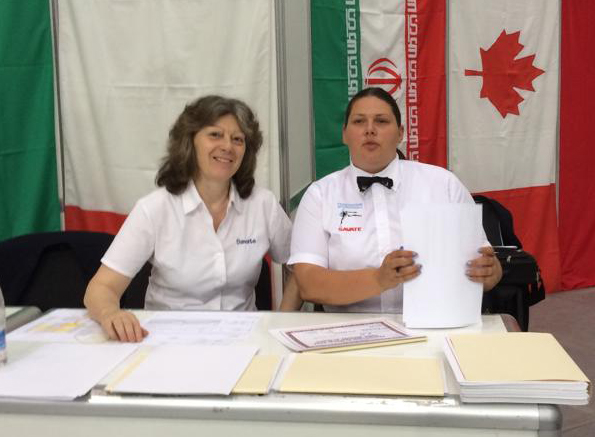 the president and the DOG preparing diplomas